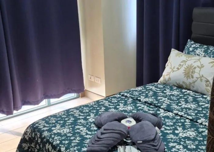 Apartahotel Rqui Condotel Near Airports And Newport World Casino